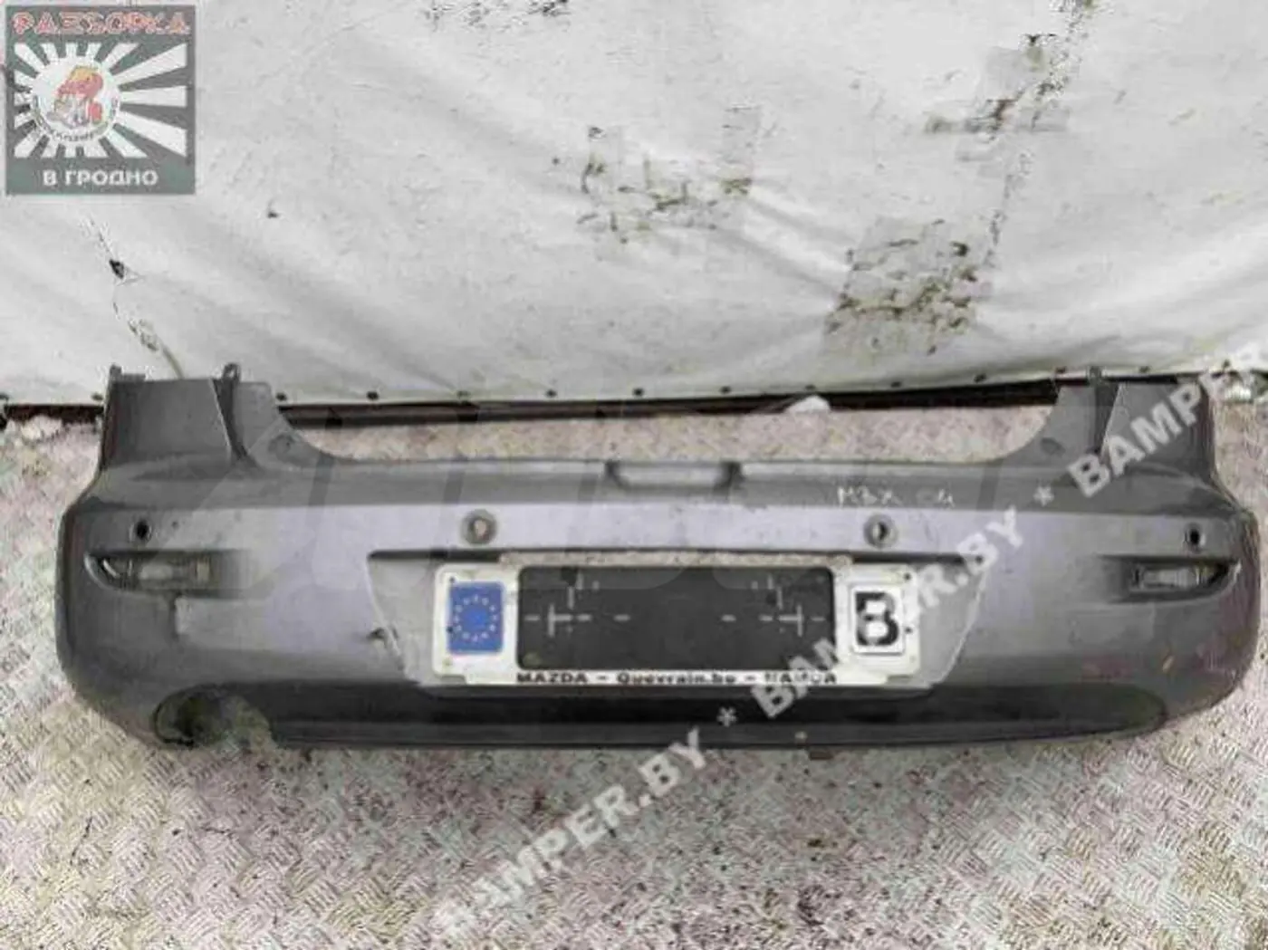 Бампер задний к Mazda 3 2004