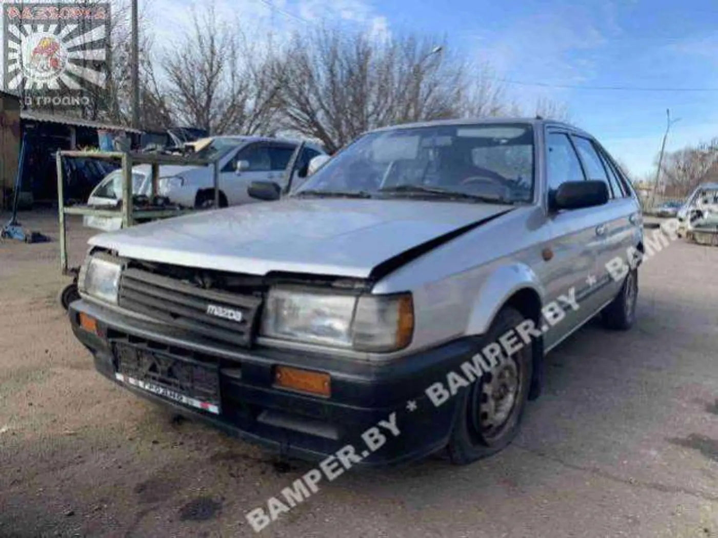 Кулак задний левый к Mazda 323 1987