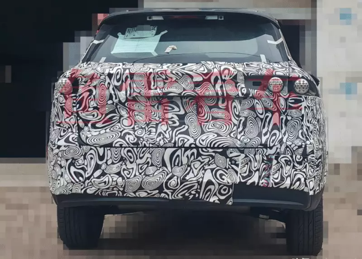 Появились фото нового кроссовера Chery T38 в камуфляже