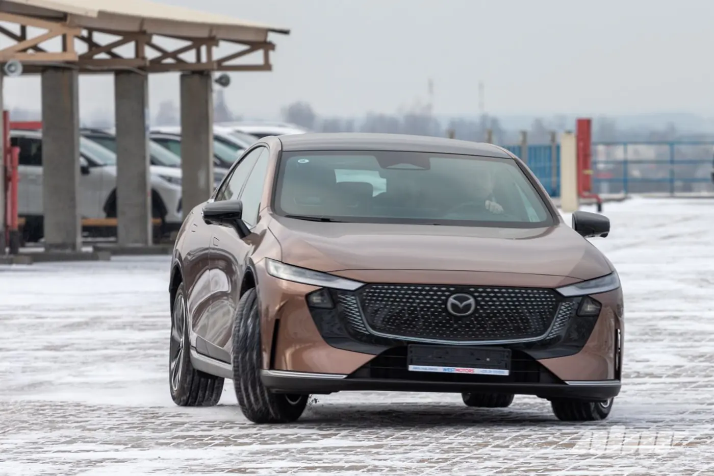 Mazda EZ-6 на фоне предшественницы: гнев, торг, принятие