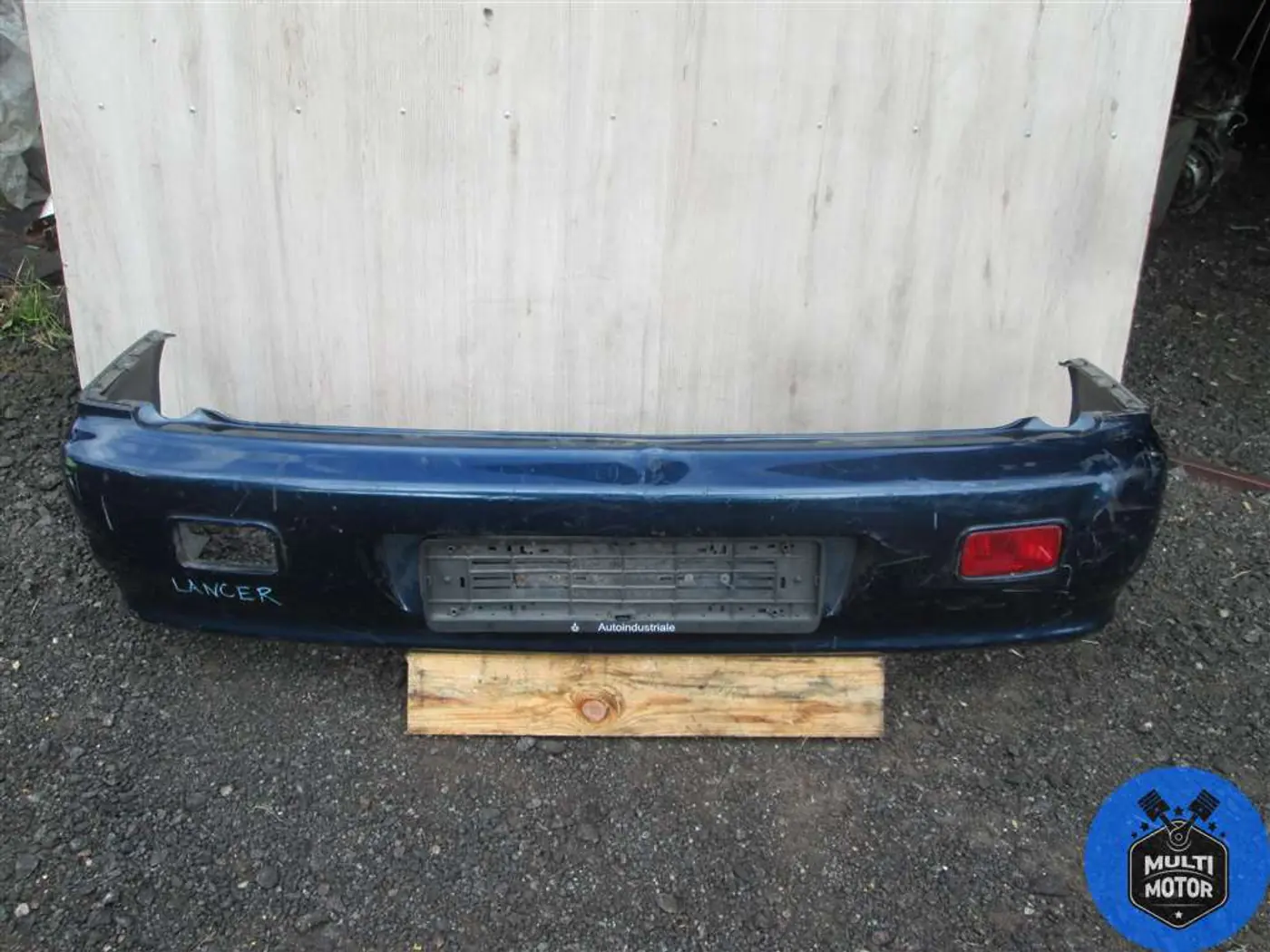 Бампер задний к Mitsubishi Lancer 2006