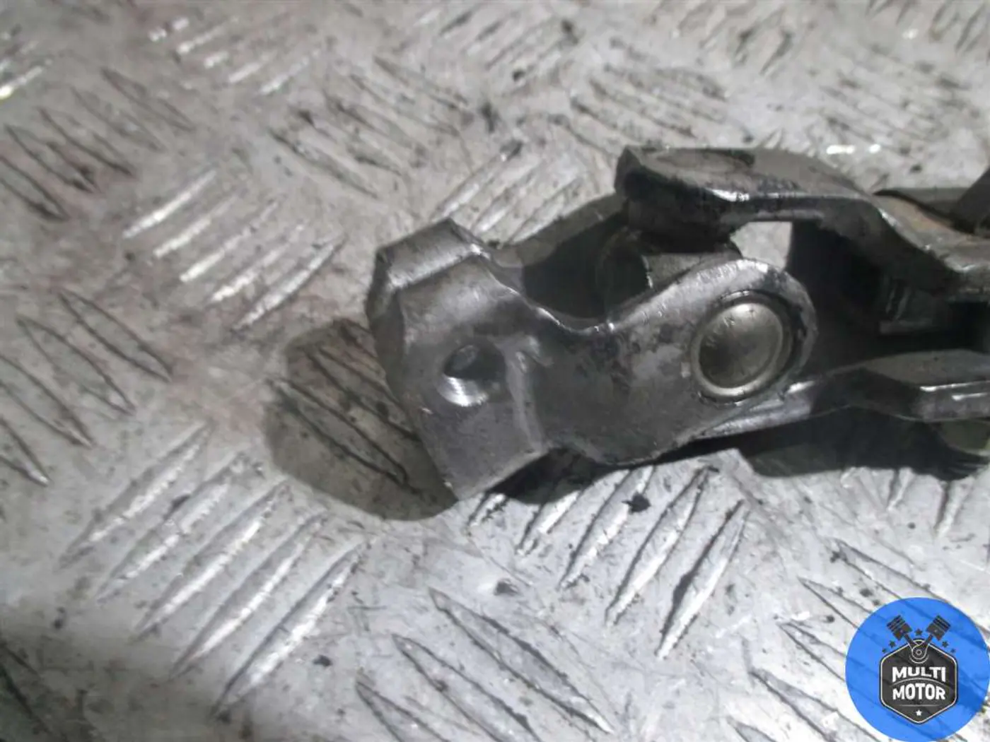 Рулевой карданчик к Mazda 323 2000