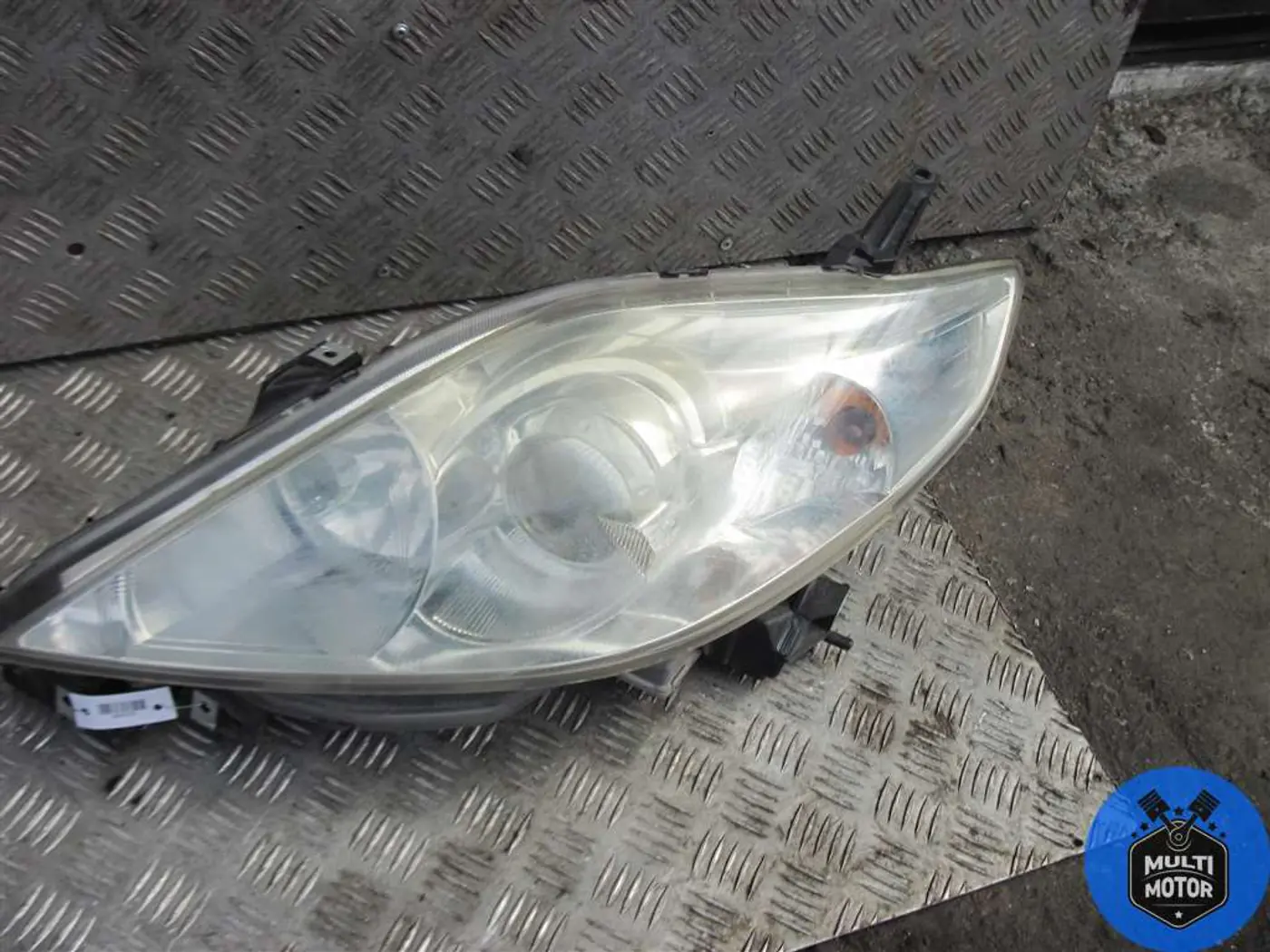 Фара левая к Mazda 5 2006