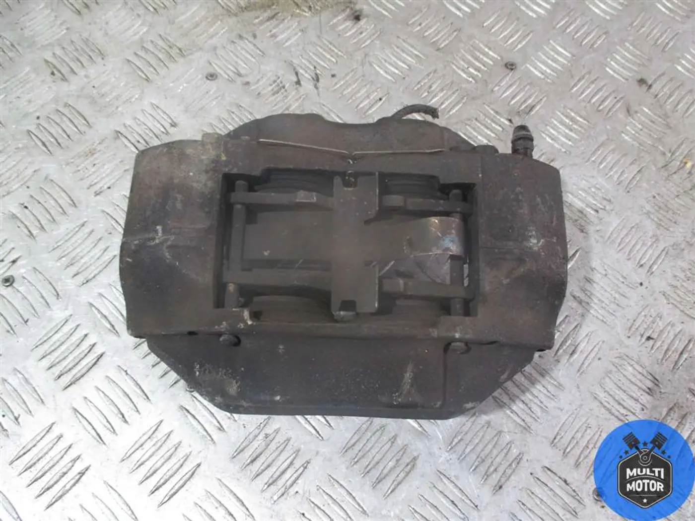 Суппорт передний правый к Toyota Land Cruiser Prado 2000