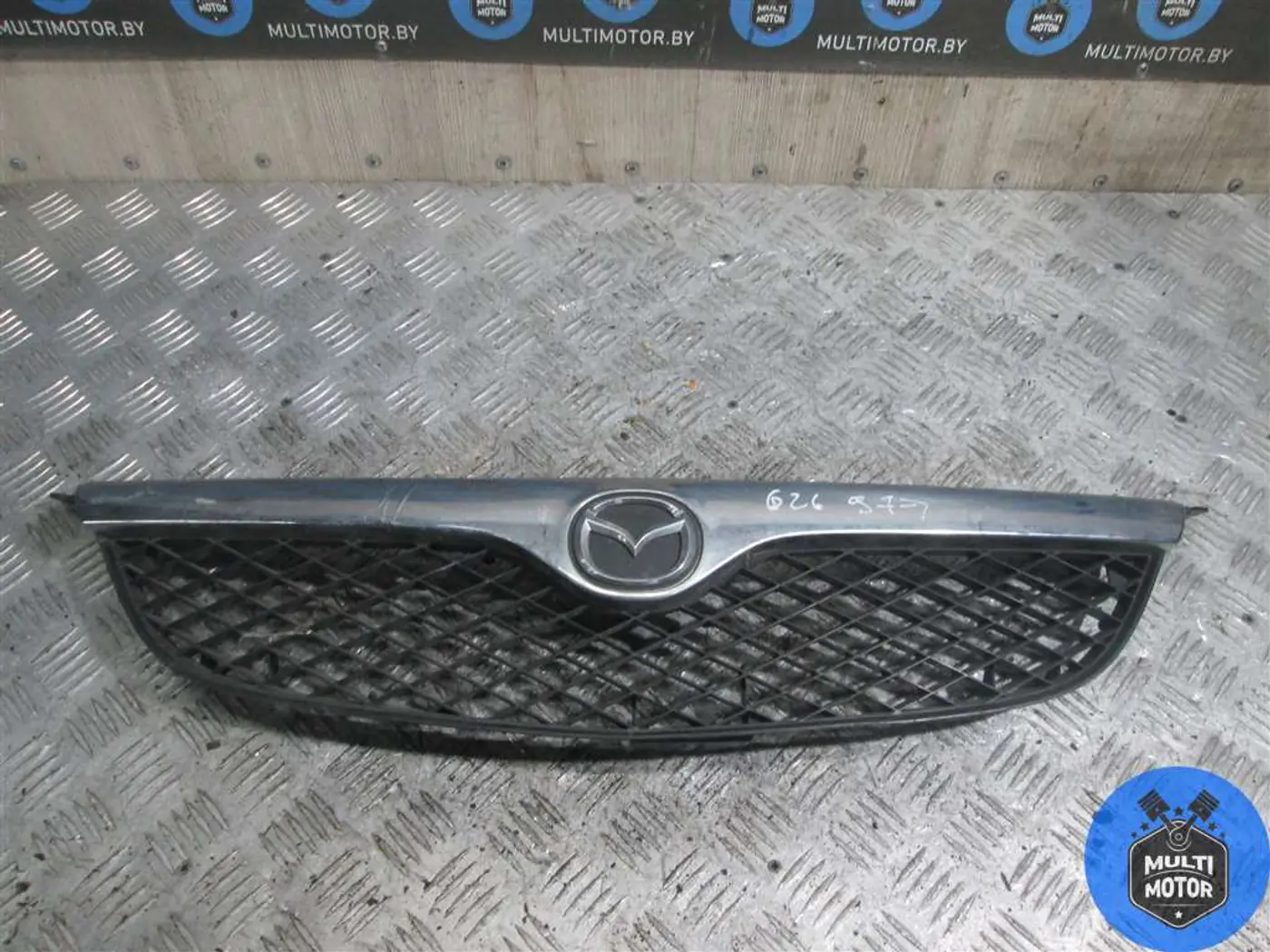 Решетка радиатора к Mazda 626 1998