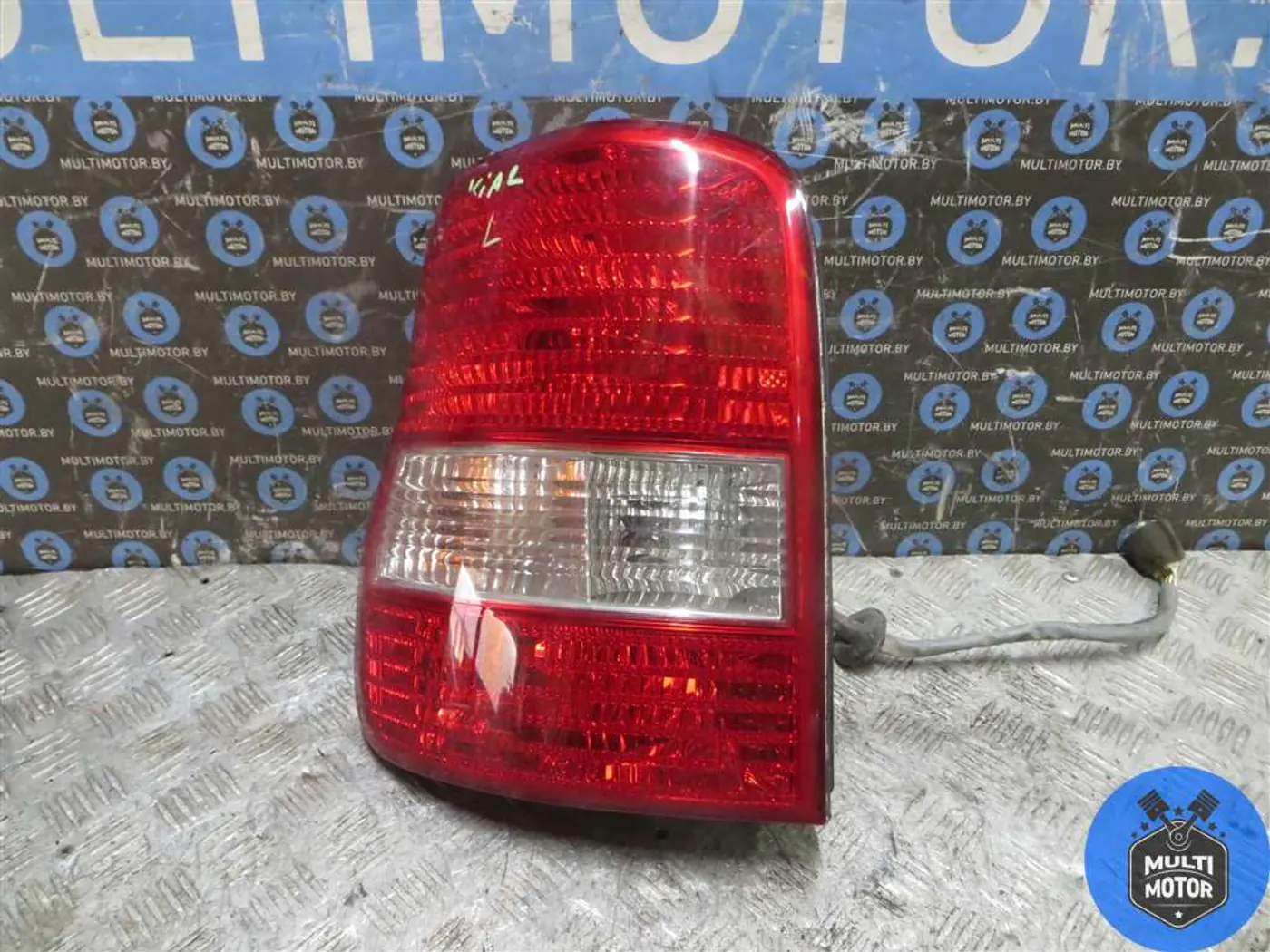 Фонарь задний левый к Kia Carnival 2003