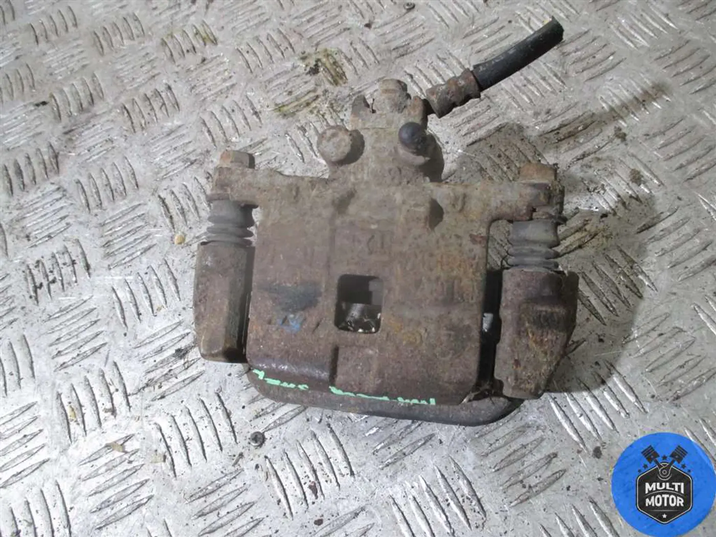 Суппорт задний правый к Subaru Impreza 2002