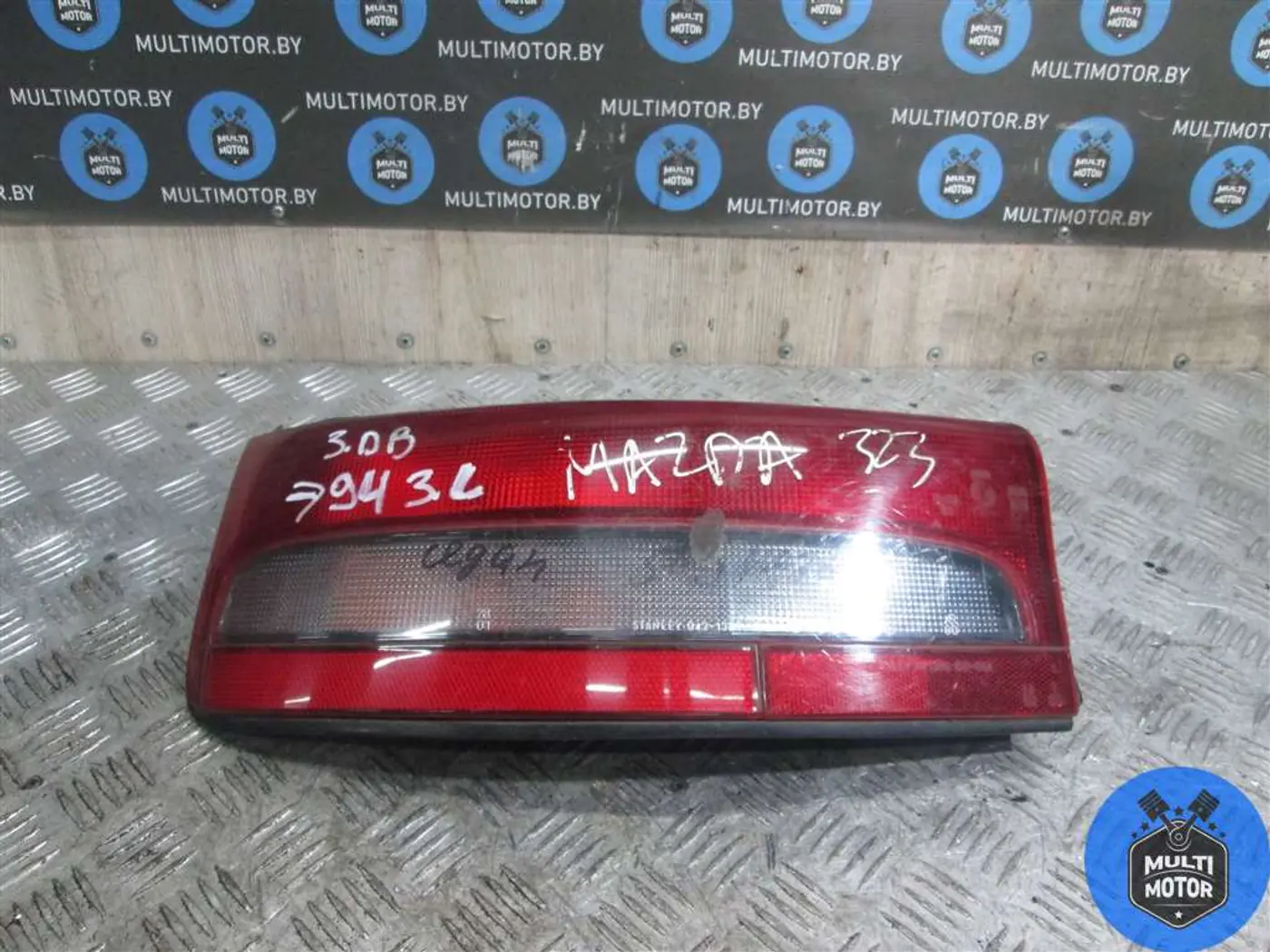 Фонарь задний левый к Mazda 323 1992