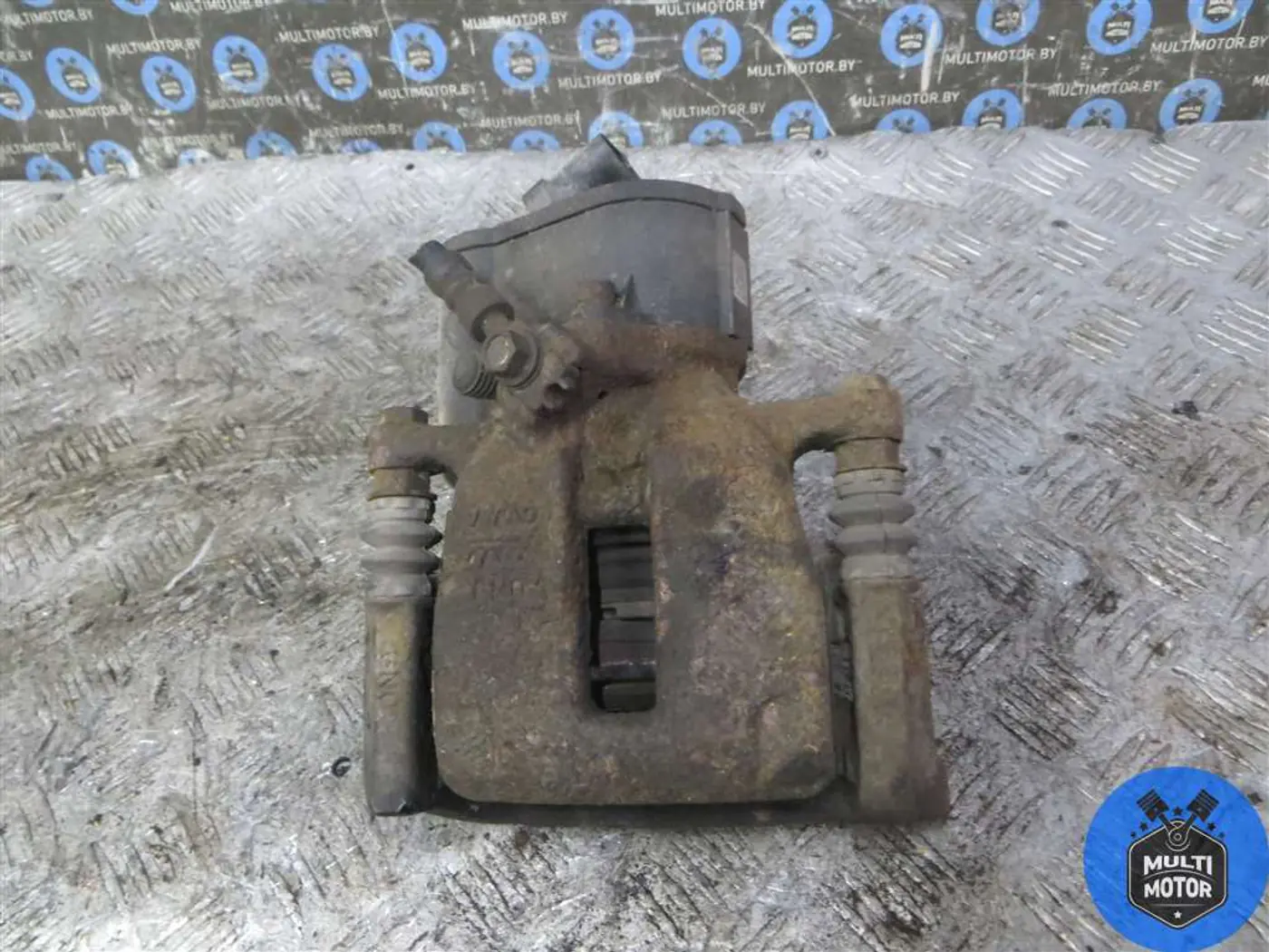 Суппорт задний правый к Volkswagen Passat 2007