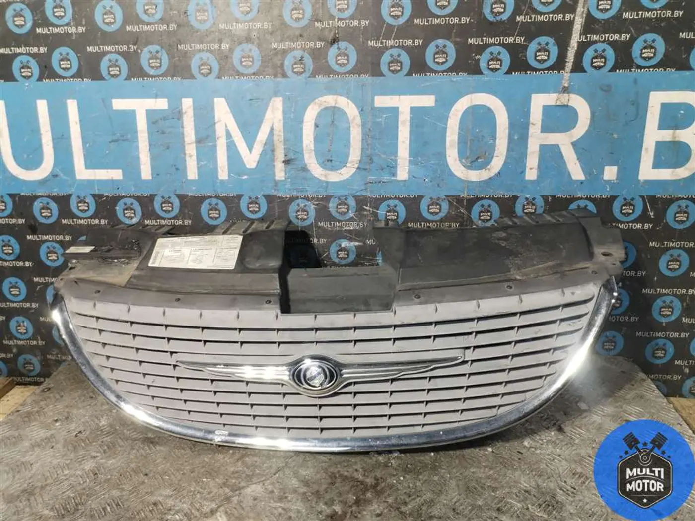 Решетка радиатора к Chrysler Voyager 2002