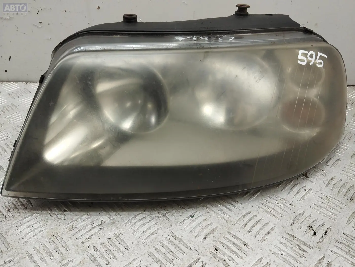 Фара левая к SEAT Alhambra 2001