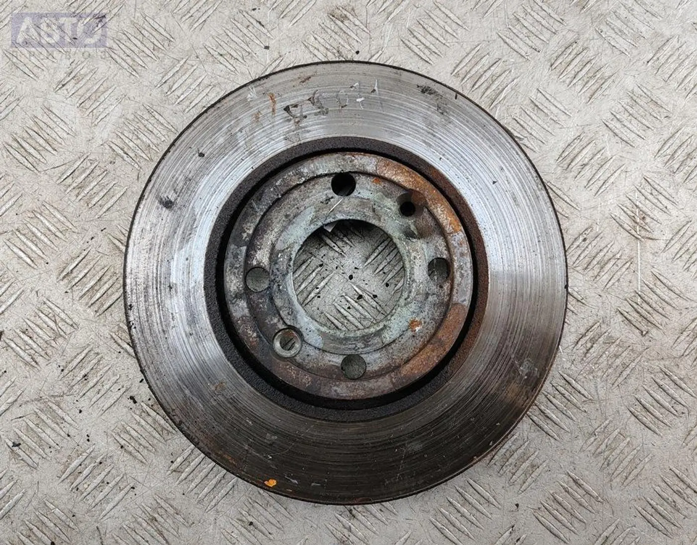 Диск тормозной передний к Nissan Note 2006