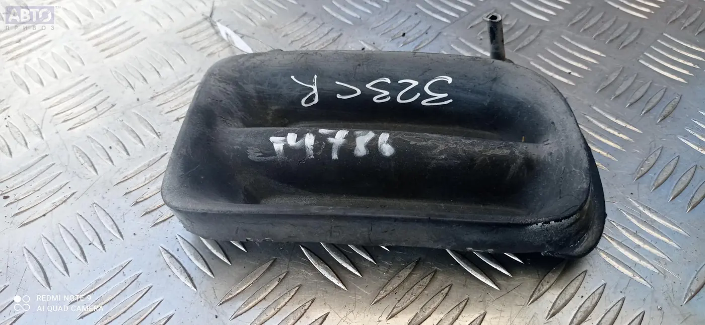 Решетка бампера к Mazda 323 1995