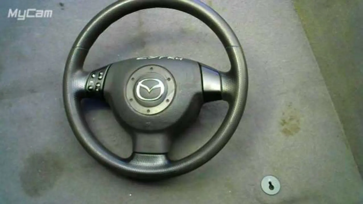 Руль к Mazda 2 2004