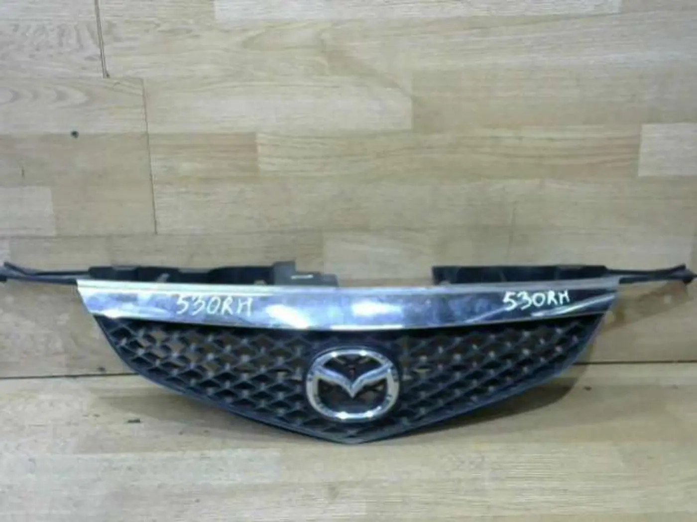 Решетка радиатора к Mazda Premacy 2000