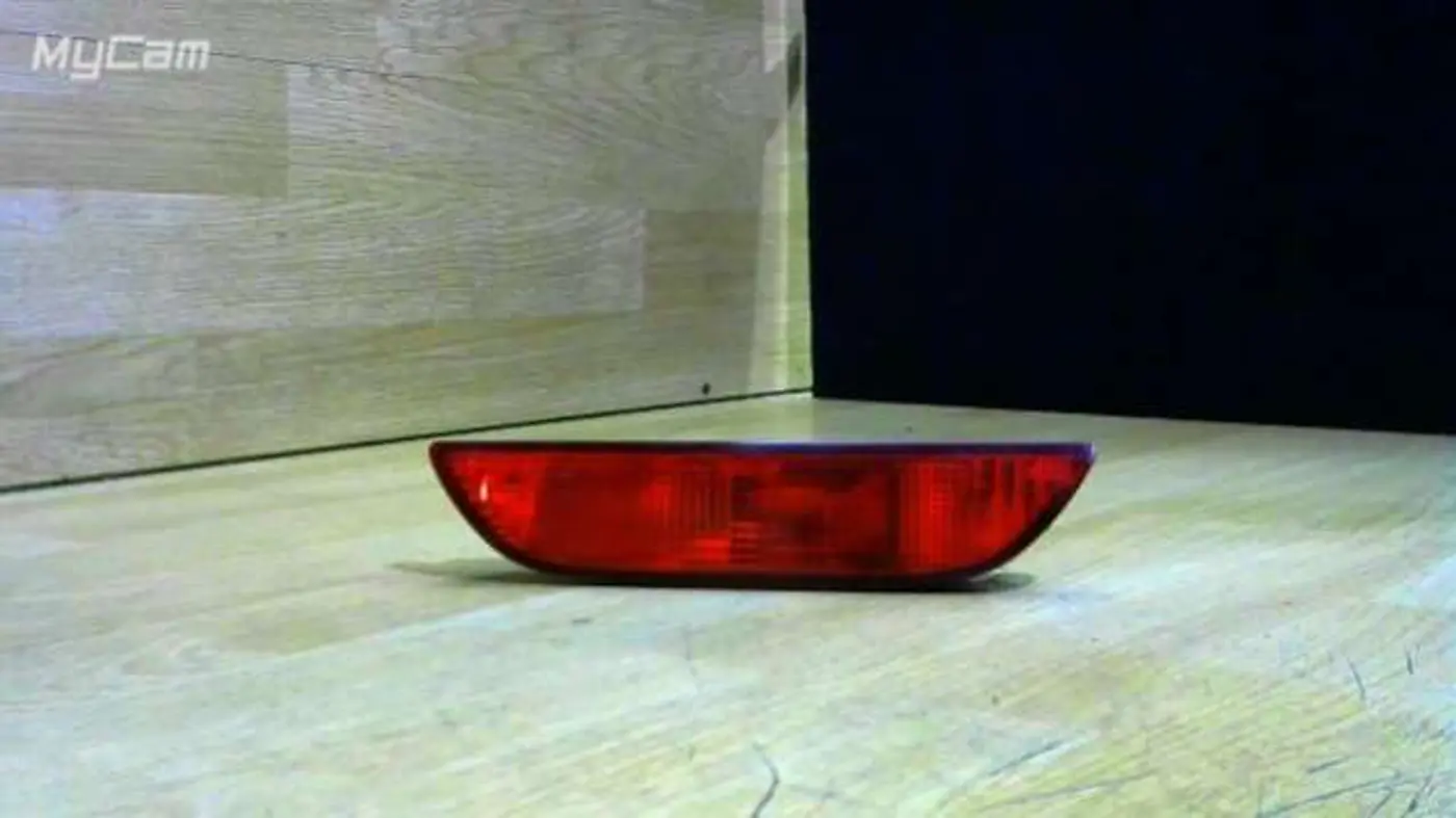 Фонарь противотуманный центральный к Nissan Note 2008