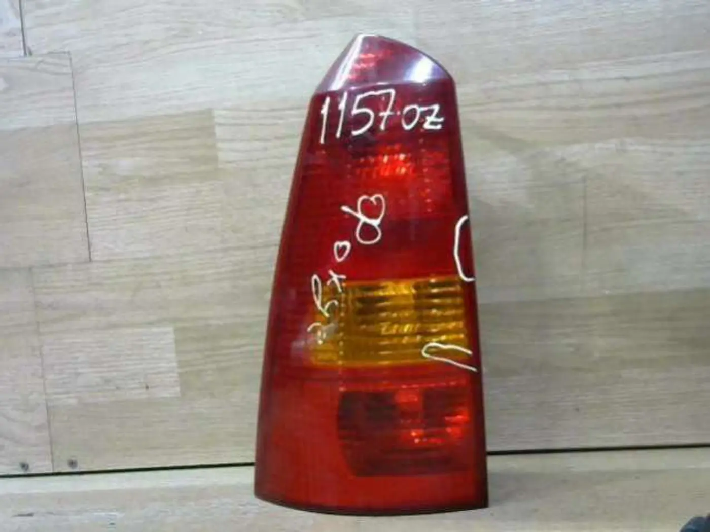 Фонарь задний левый к Ford Focus 2004