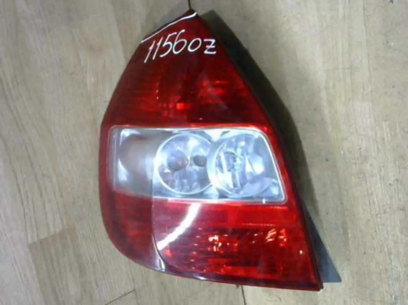 Фонарь задний левый к Honda Jazz 2003
