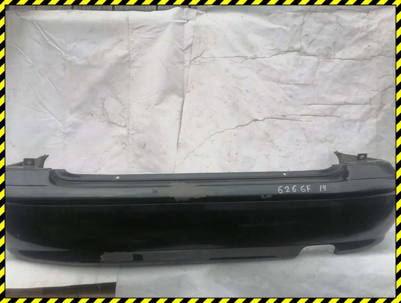 Бампер задний к Mazda 626 1998