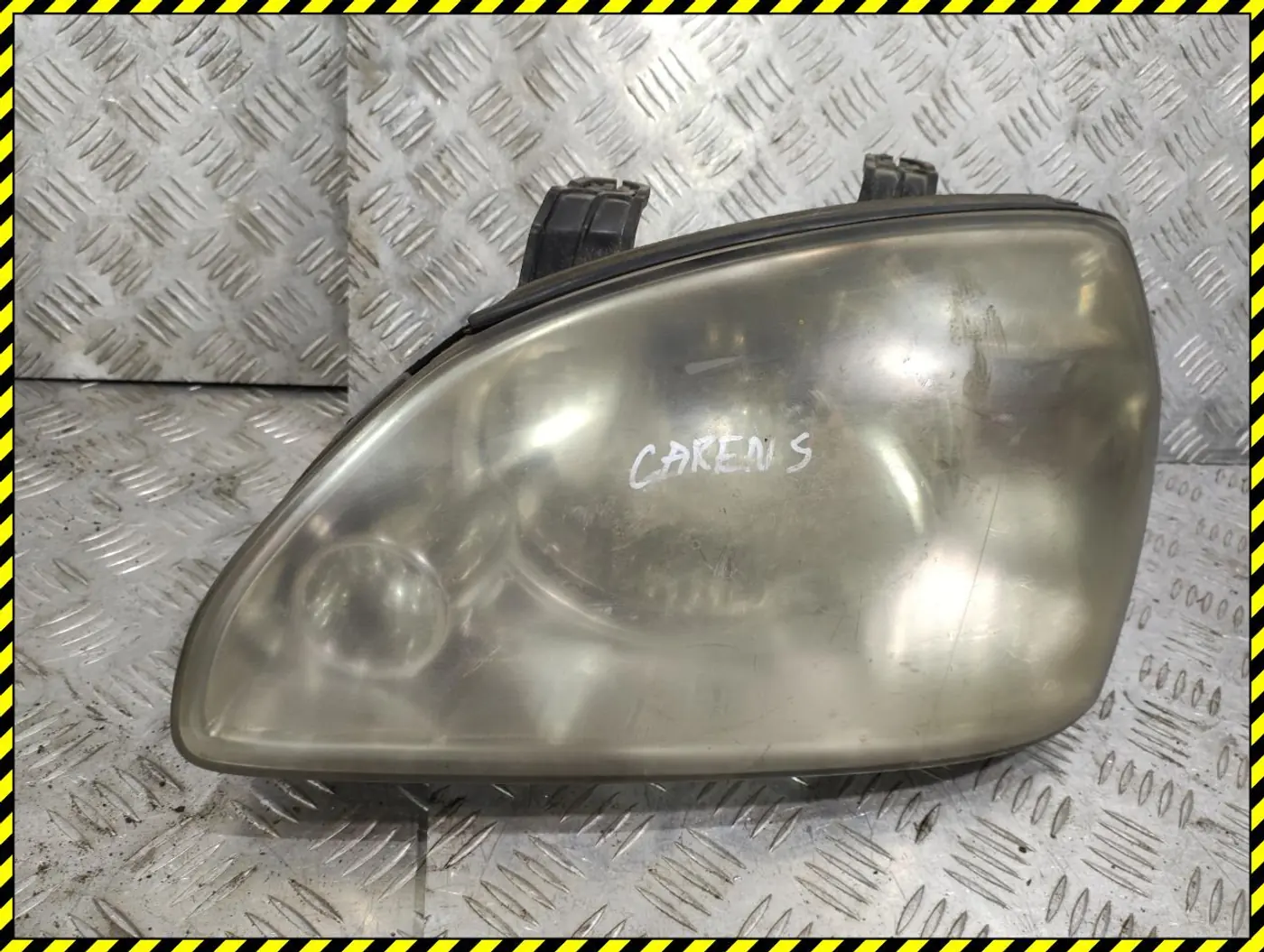 Фара левая к Kia Carens 2005