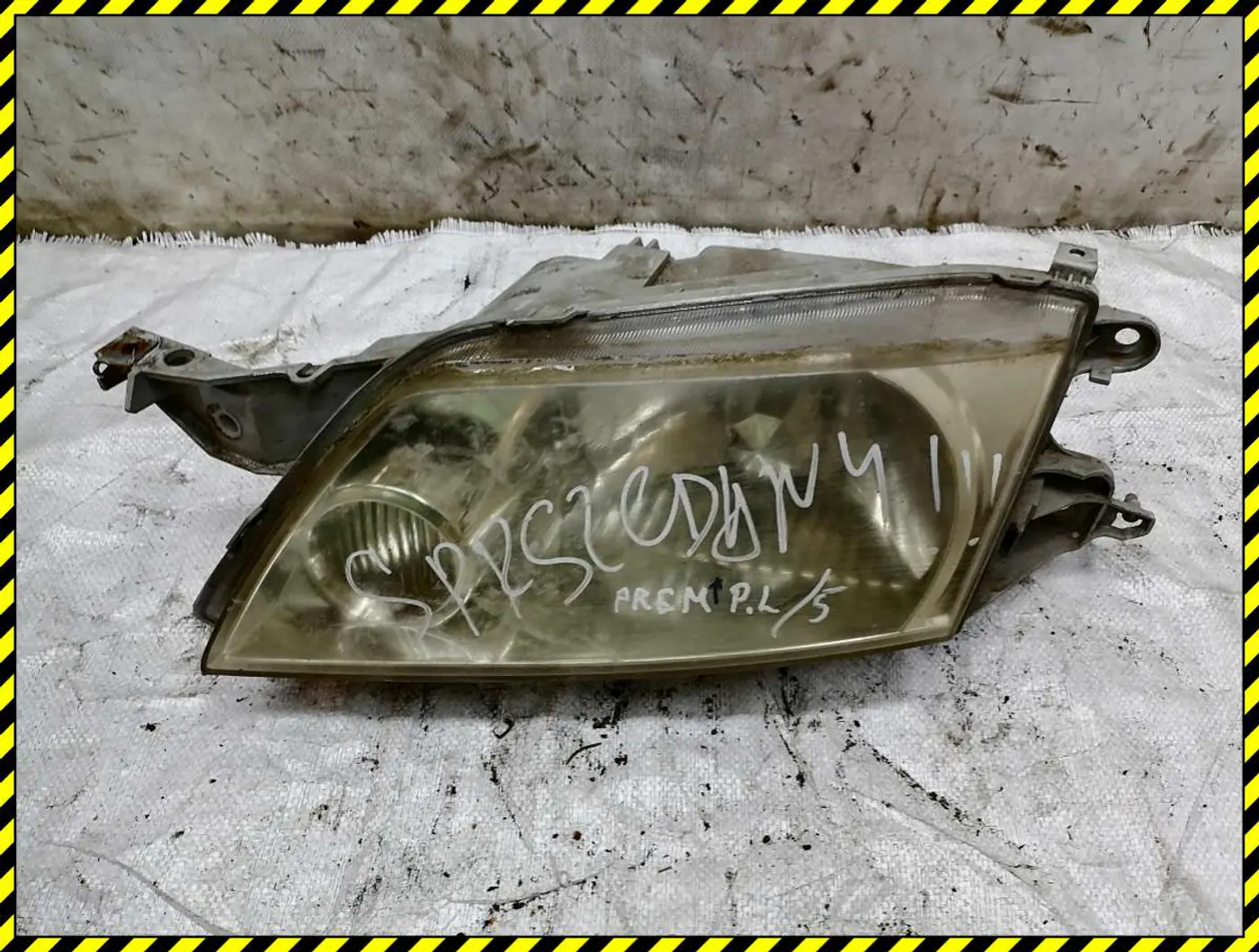 Фара левая к Mazda Premacy 2003