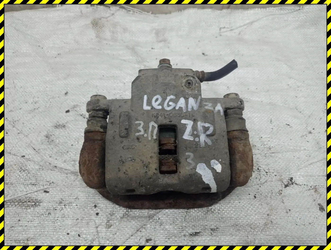 Суппорт задний левый к Daewoo Leganza 2001