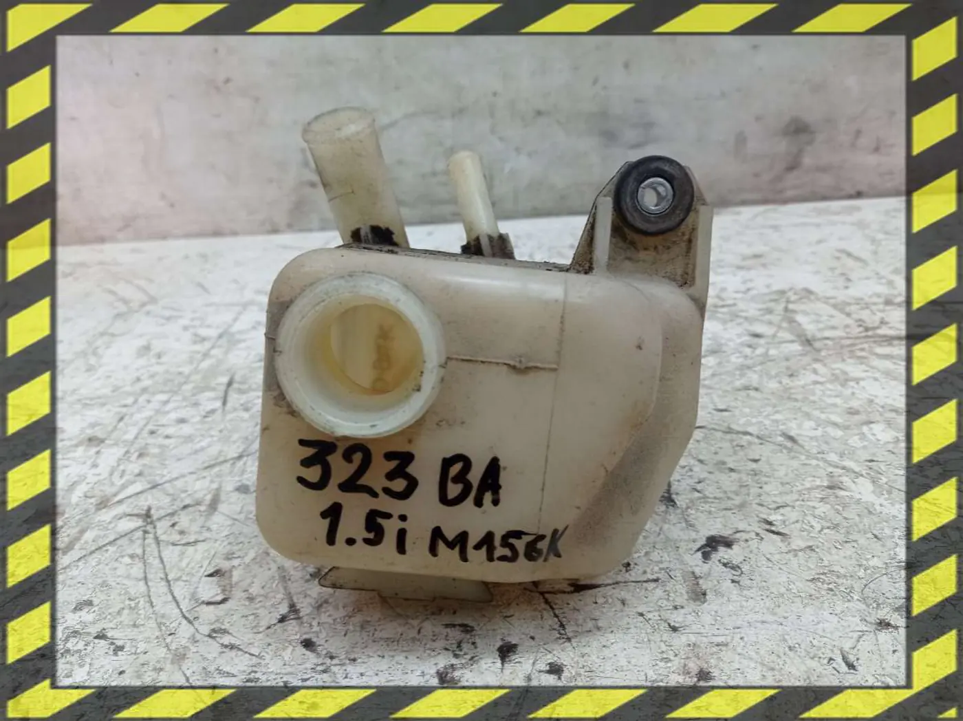 Бачок расширительный к Mazda 323 1996