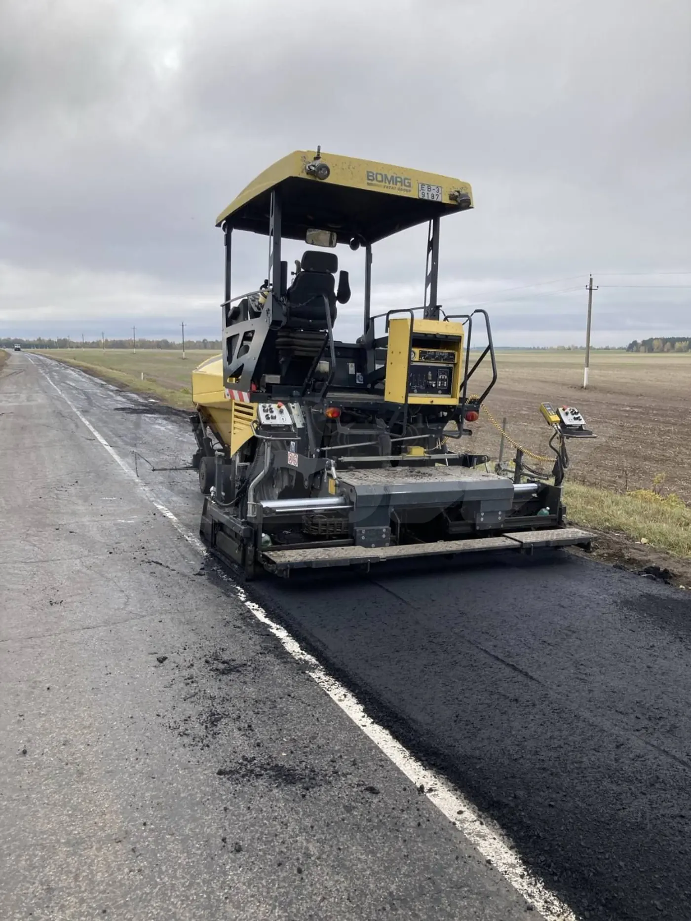 асфальтоукладчик Bomag BF300C 2013