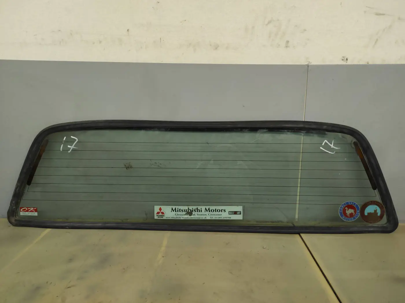Стекло заднее к Mitsubishi L200 2011