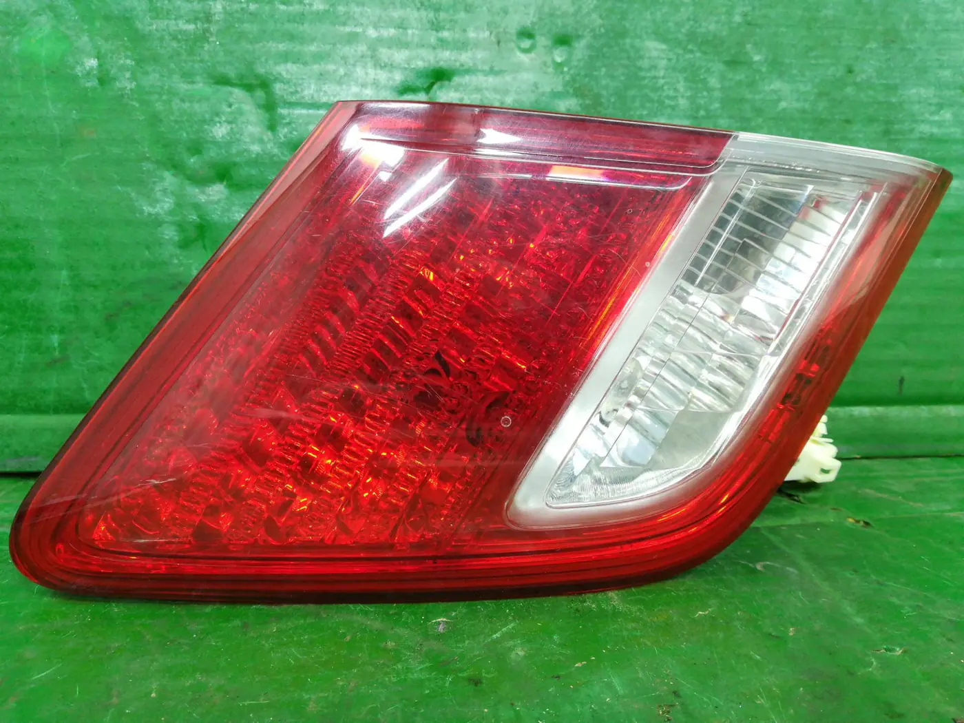 Фонарь крышки багажника левый к Toyota Camry 2009