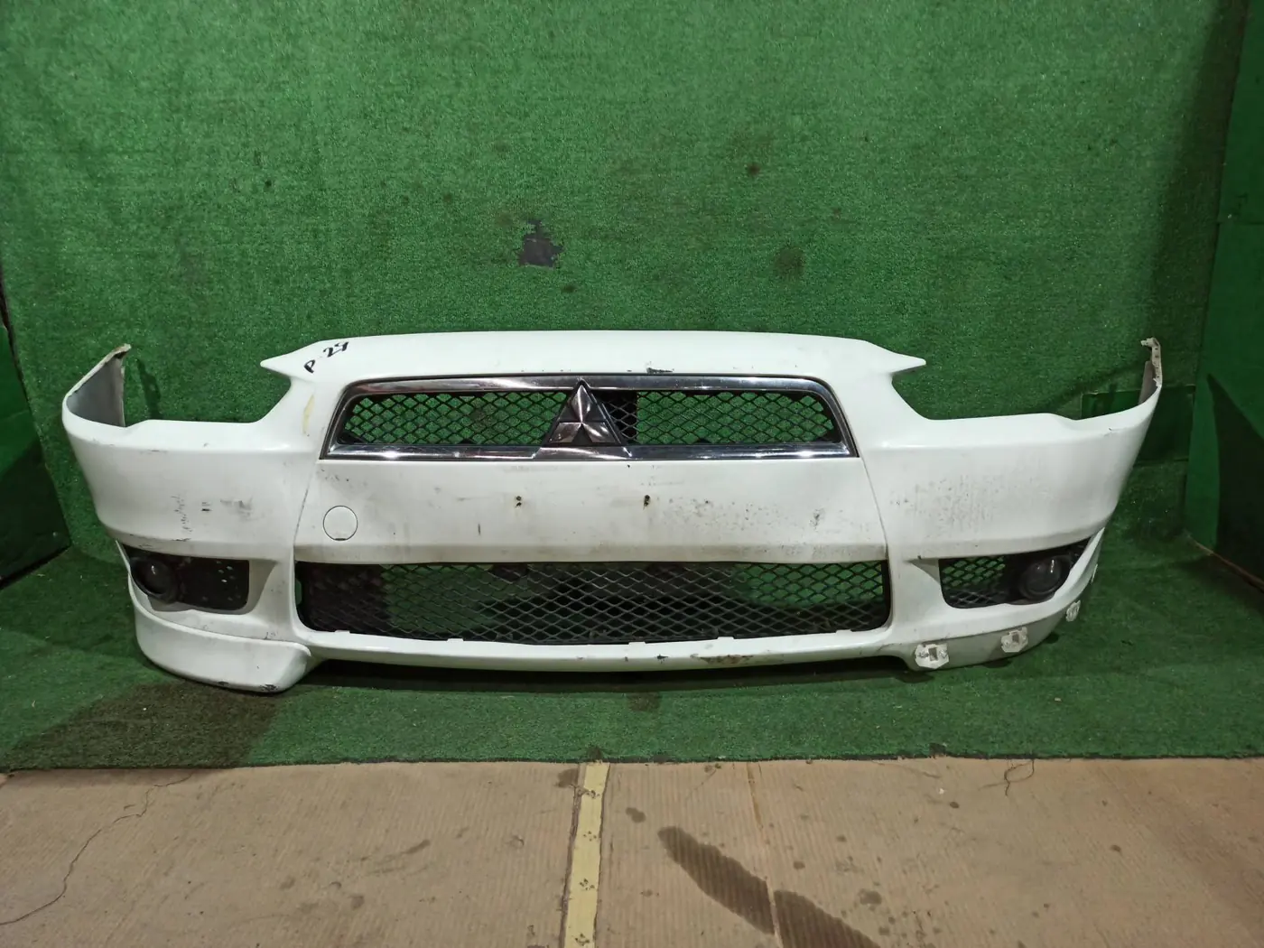 Бампер передний к Mitsubishi Lancer 2010