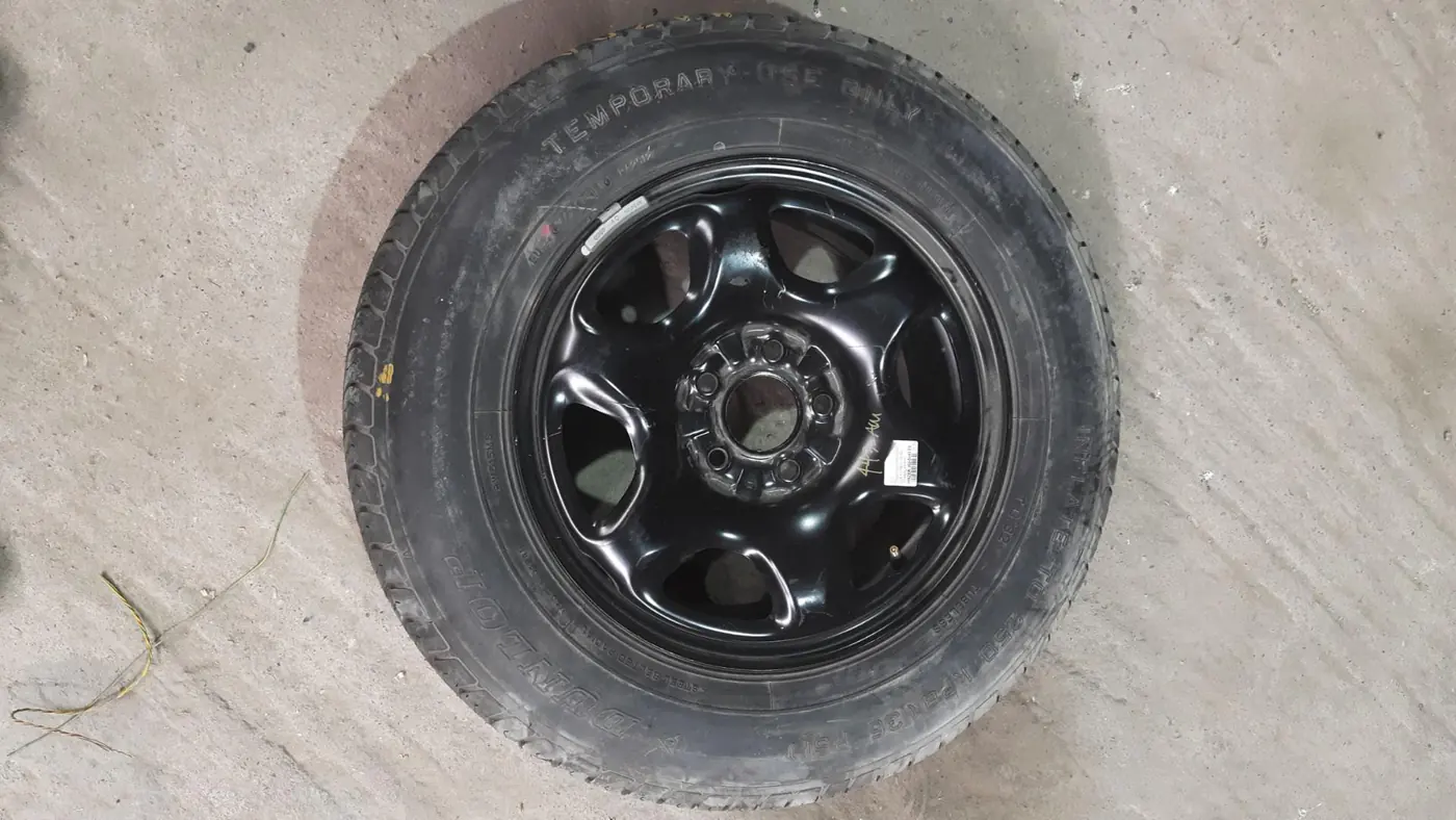 Колесо запасное (таблетка) к Mazda Tribute 2004