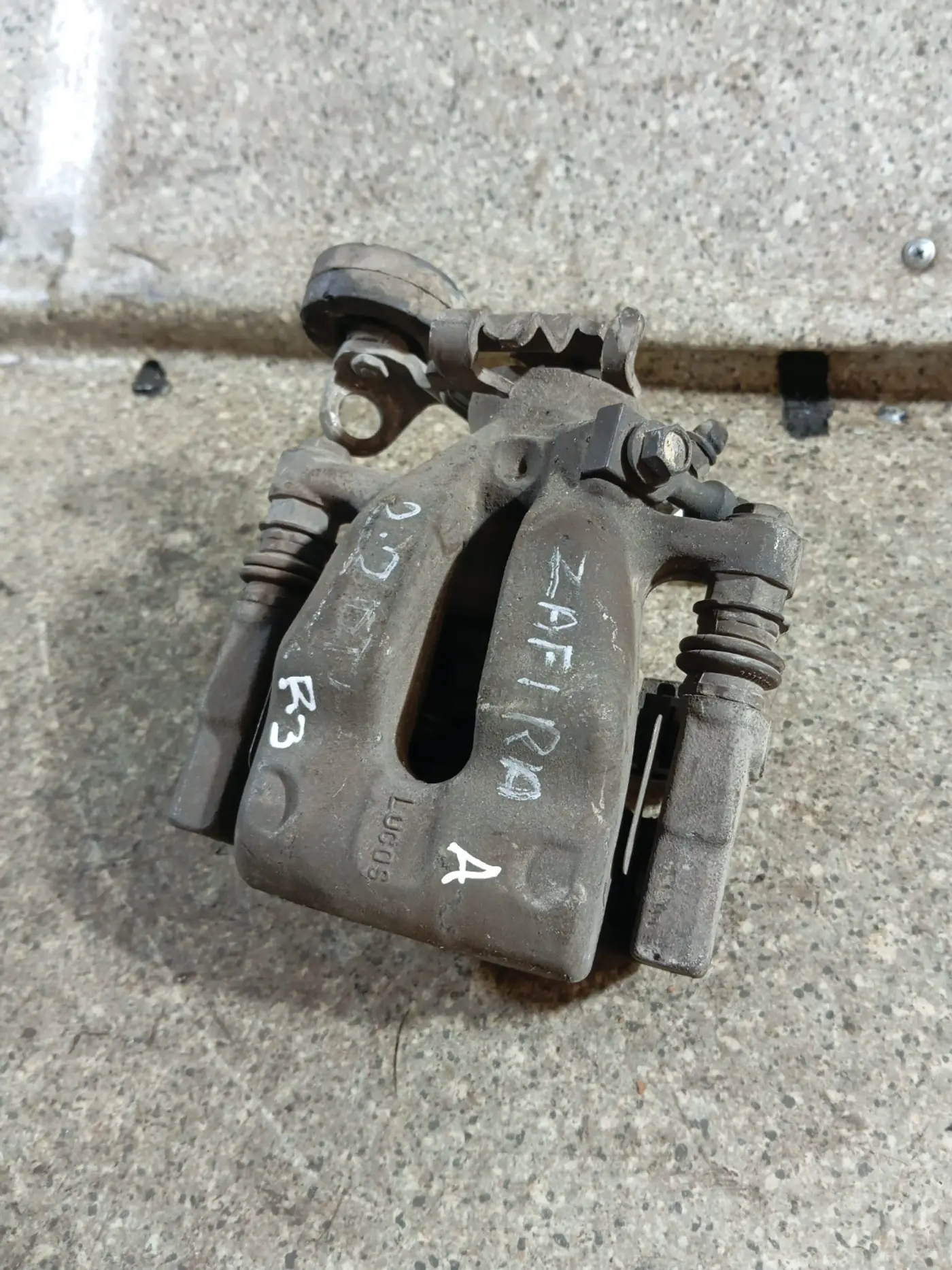 Суппорт задний правый к Opel Astra 2006