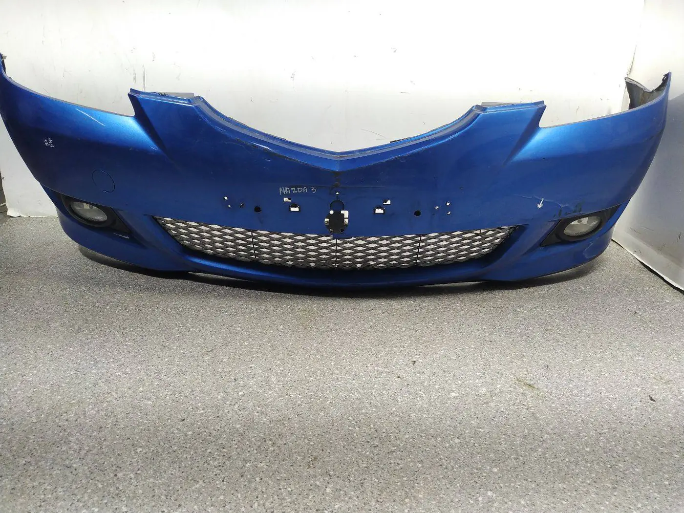 Бампер передний к Mazda 3 2005
