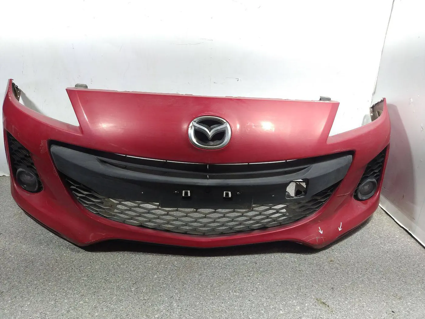 Бампер передний к Mazda 3 2010