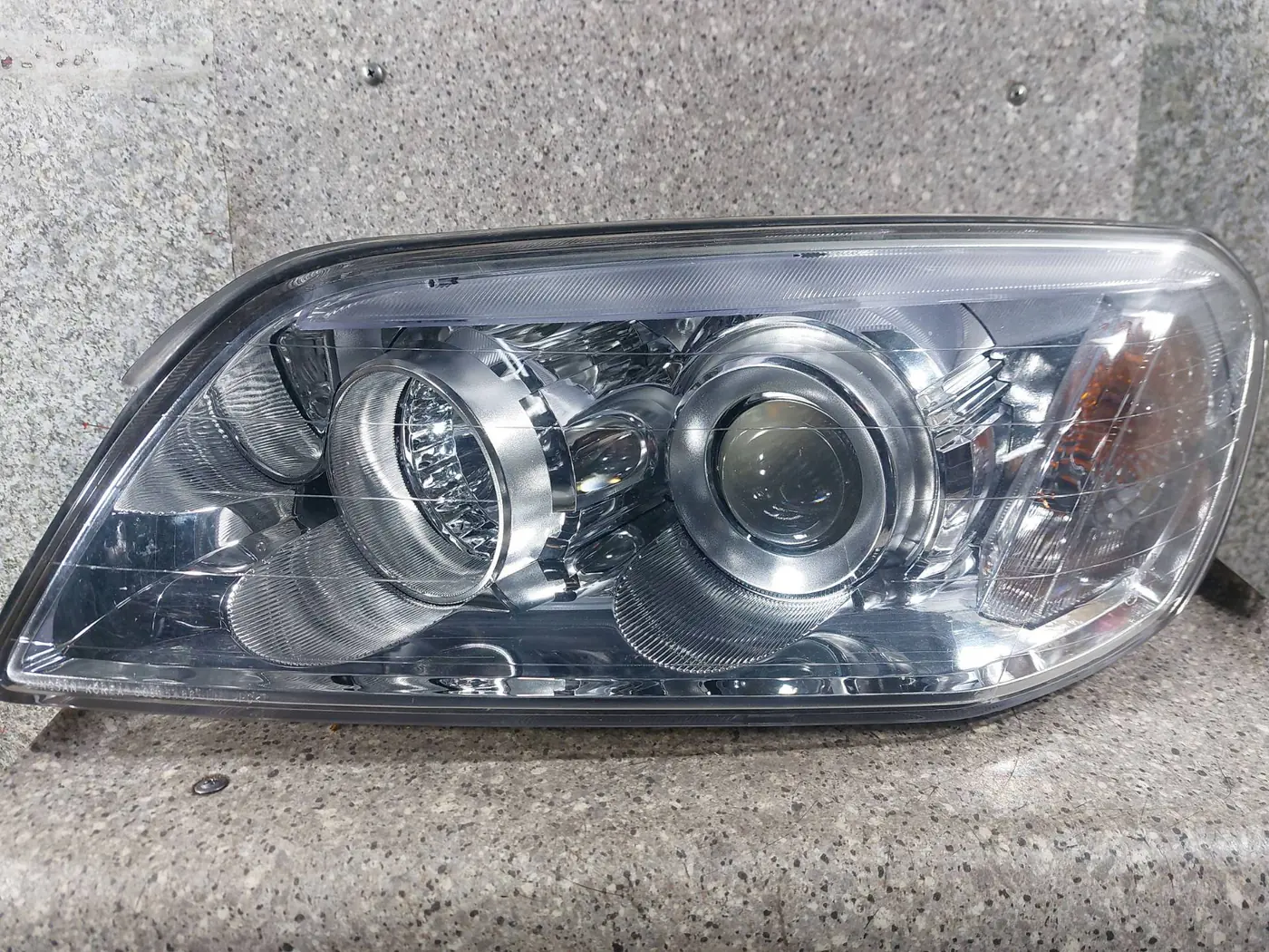 Фара левая к Chevrolet Captiva 2009