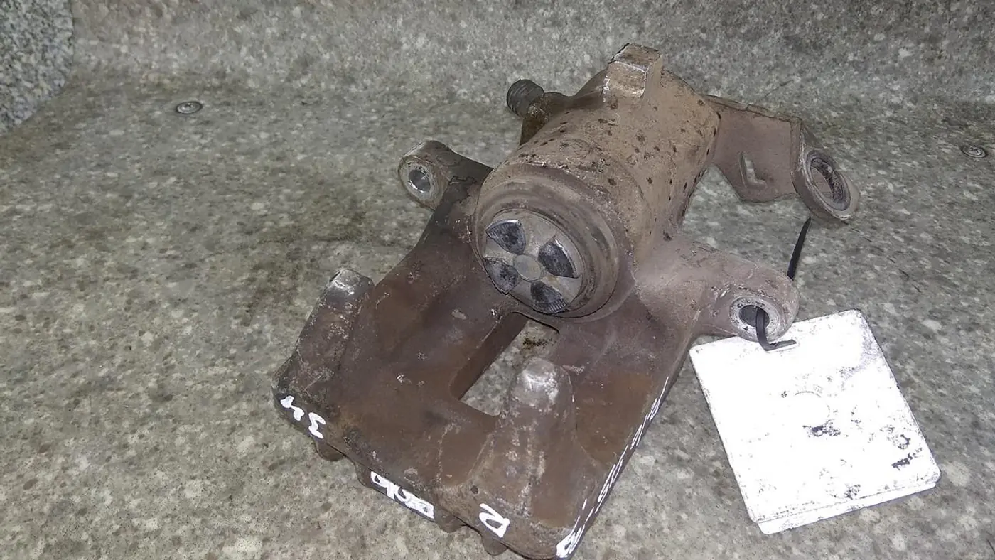 Суппорт задний правый к Volkswagen Polo 2000