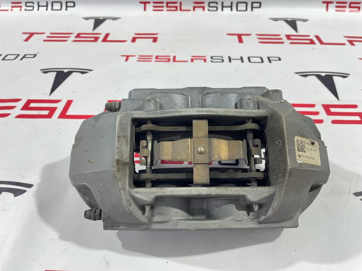 Суппорт передний левый к Tesla Model 3 2019