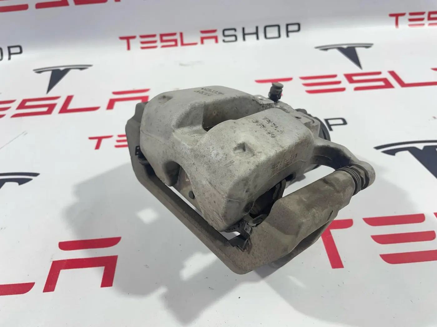 Суппорт задний левый к Tesla Model 3 2019