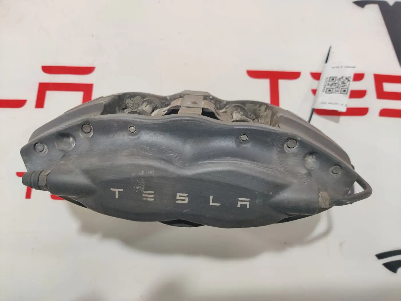 Суппорт задний левый к Tesla Model X 2016