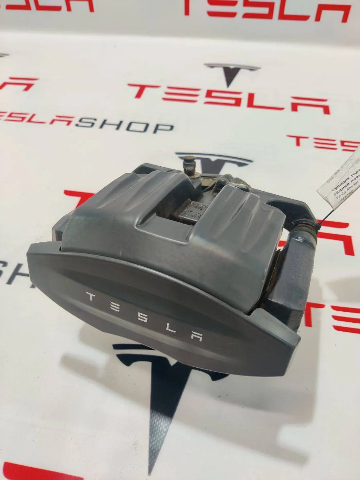 Суппорт задний левый к Tesla Model X 2019