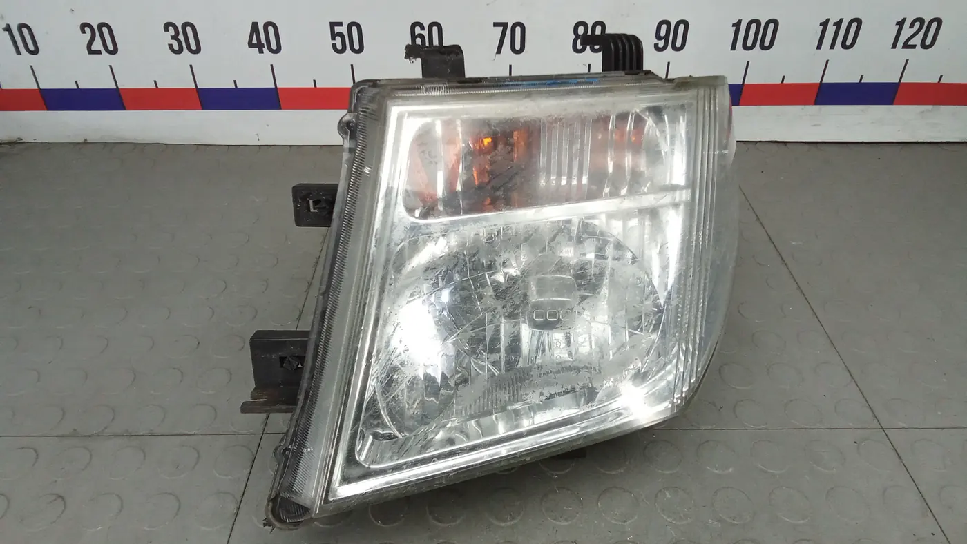 Фара левая к Nissan Navara (Frontier) 2007