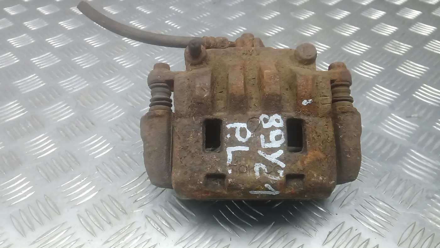 Скоба суппорта к Subaru Outback 2005