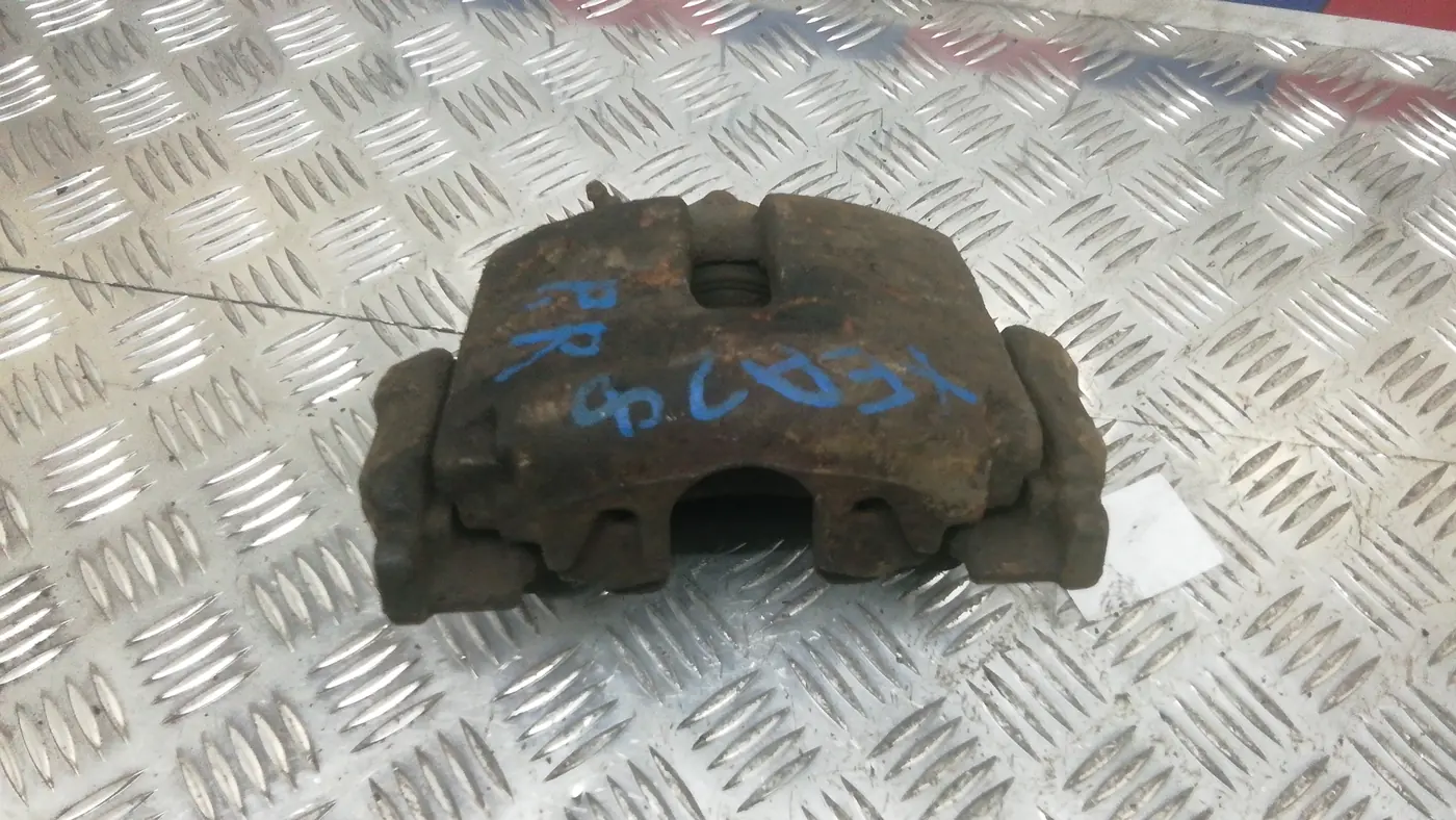 Скоба суппорта к Volkswagen Passat 2009
