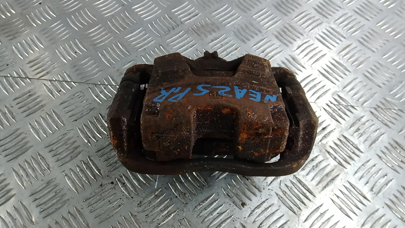 Скоба суппорта к Opel Astra 2011