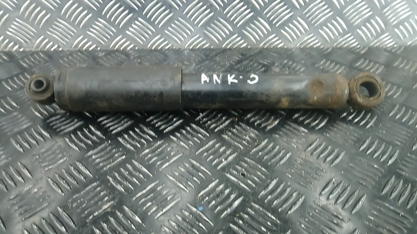 Амортизатор двери к Nissan  2008