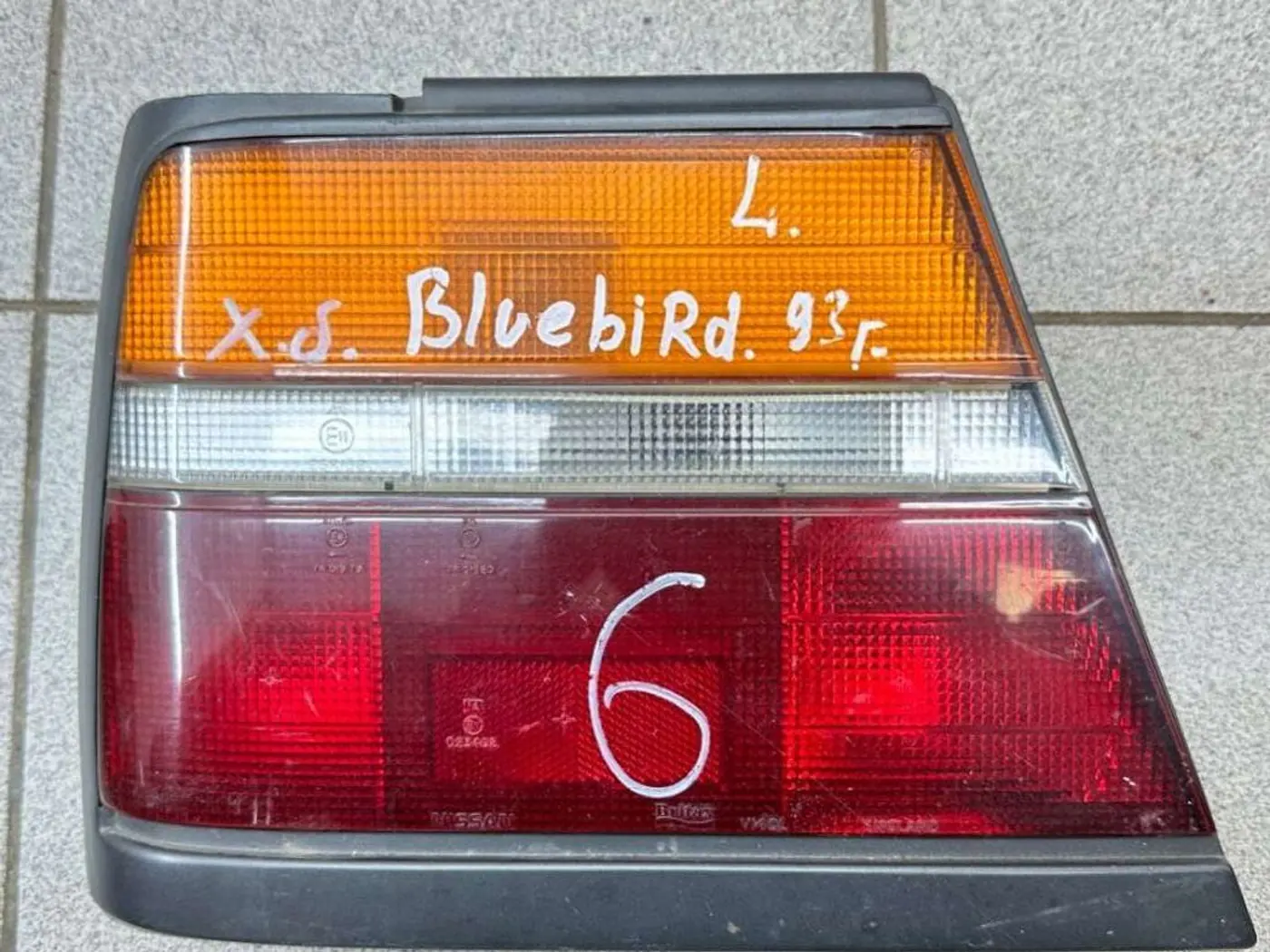 Фонарь задний левый к Nissan Bluebird 1993