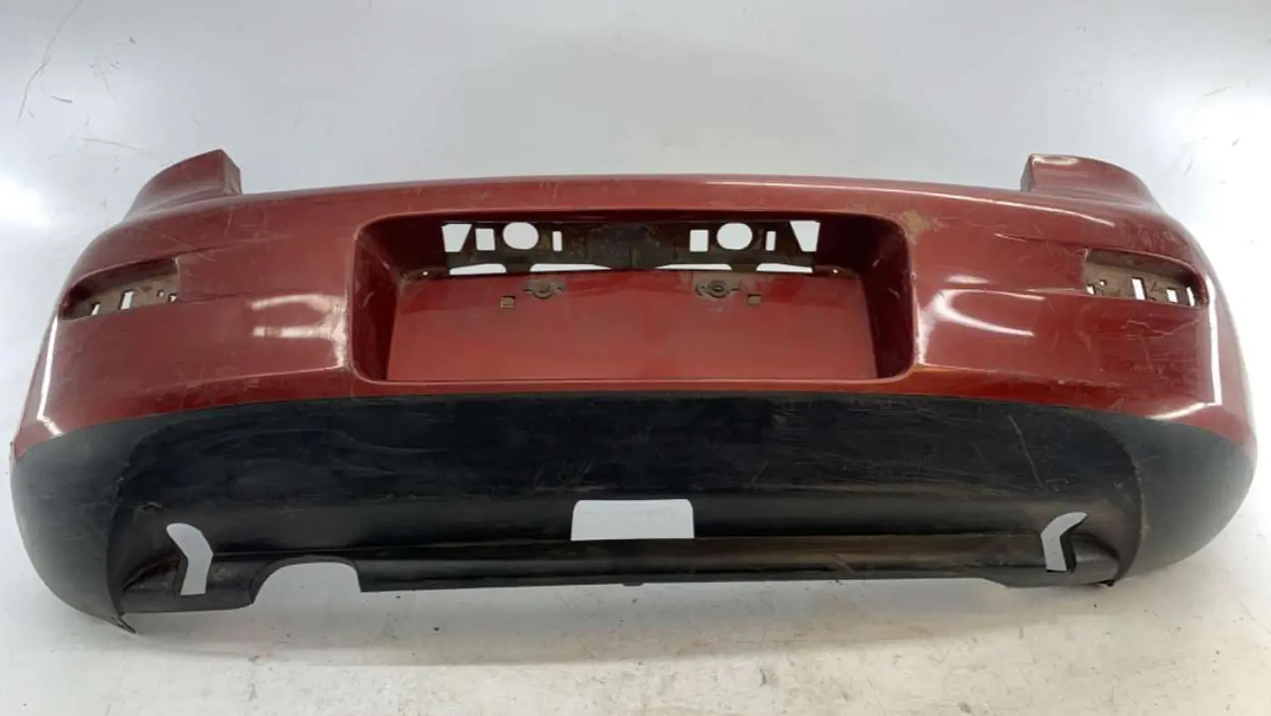 Бампер задний к Mazda 323 1997