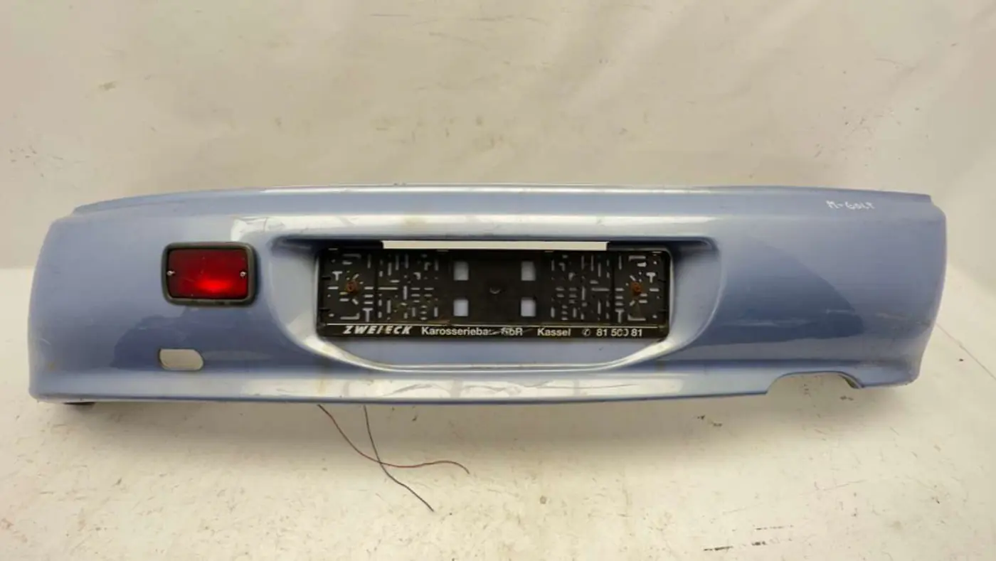 Бампер задний к Mitsubishi Colt 1994