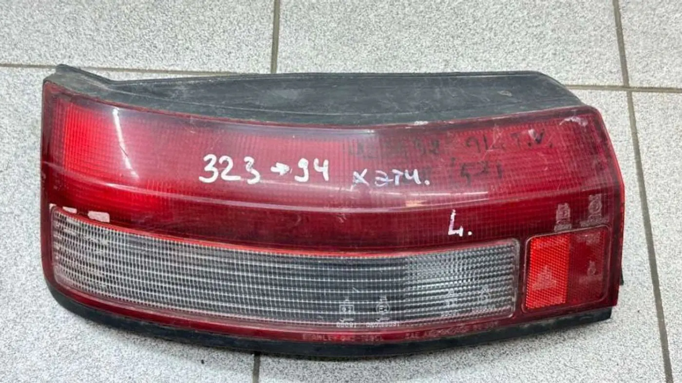 Фонарь задний левый к Mazda 323 1993